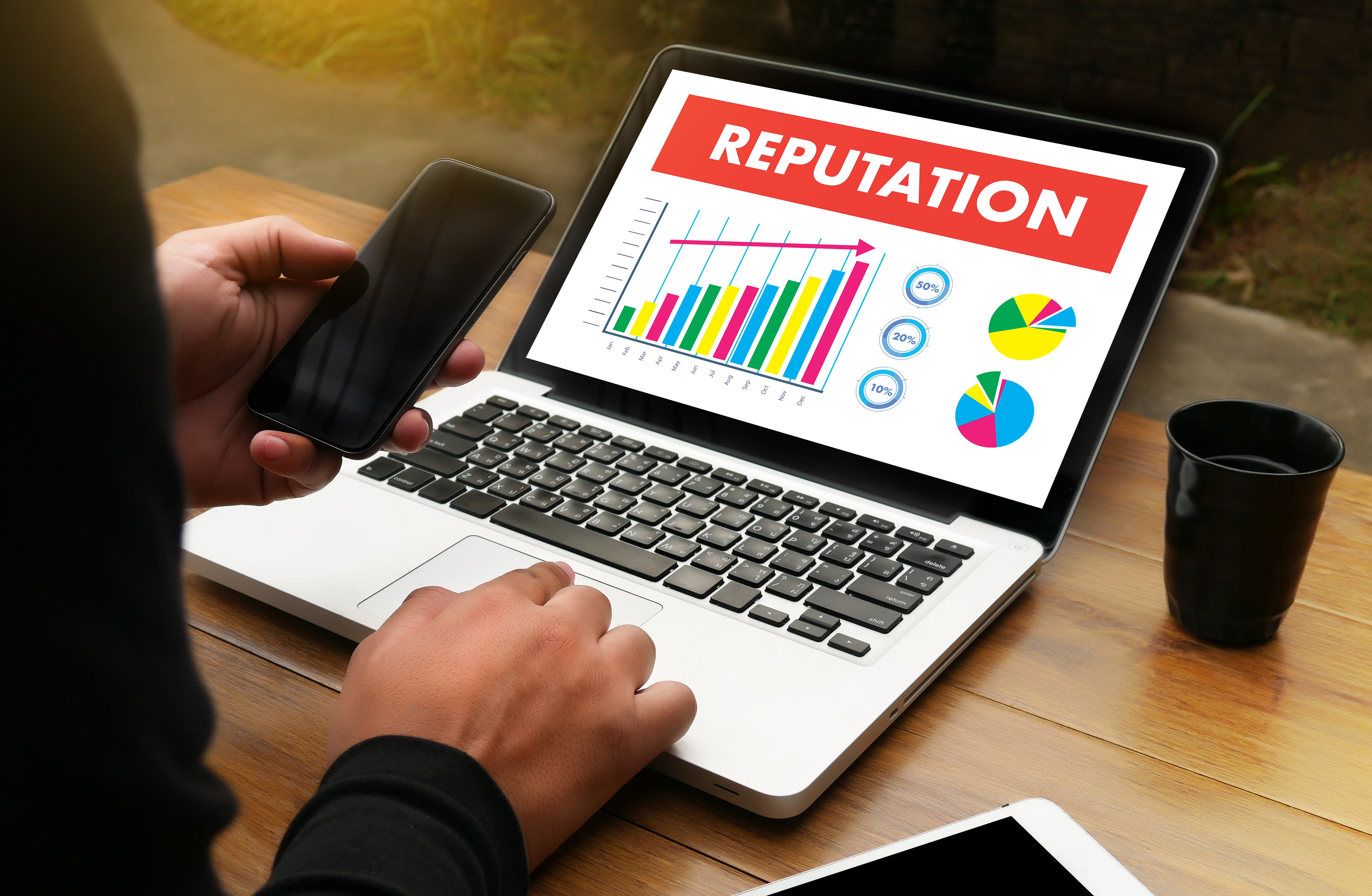 A photo of a computer showing a reputation graph